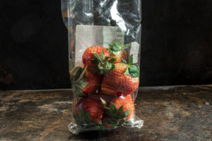 strawberrys packed in non-biodegradable plastics strawberrys packed in non-biodegradable plastics